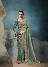 Sea Green Saree with Hand Embroidered Blouse & Border