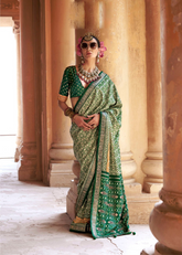 Teal Green Patola Silk Saree with Stud & Epoxy Work