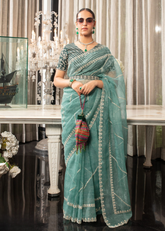Aqua Blue Organza Saree with Embroidered Blouse & Border