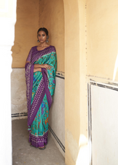 Purple & Teal Ikat Silk Saree with Animal Motif Weave