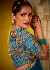 Teal Tissue Saree with Sequence Work and Designer Blouse
