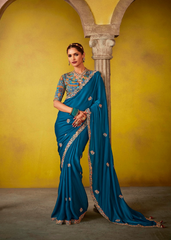 Teal Tissue Saree with Sequence Work and Designer Blouse