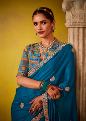 Teal Tissue Saree with Sequence Work and Designer Blouse