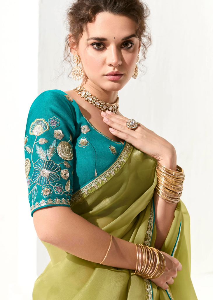 Olive Green Saree with Teal Embroidered Blouse