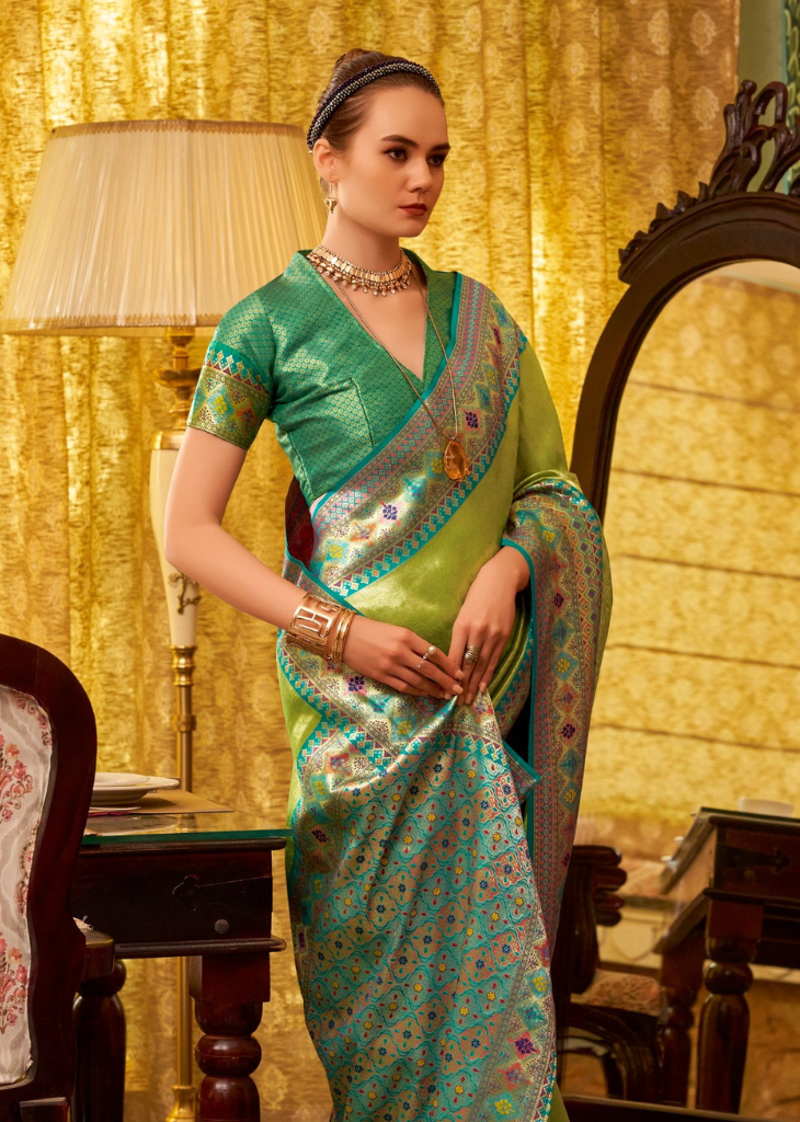 Green Tissue Silk Saree with Woven Border Work