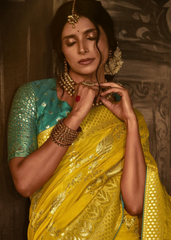 Yellow Banarasi Silk Saree with Aqua Blue Brocade Blouse