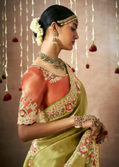 Pista Green Tissue Dola Silk Bridal Saree with Heavy Embellishments