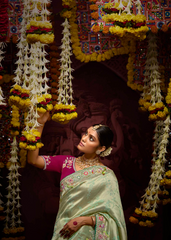 Pastel Green Kanjivaram Saree with Heavy Pallu Work