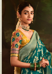 Emerald Teal Dola Silk Saree with Golden Floral Weaving & Broad Border