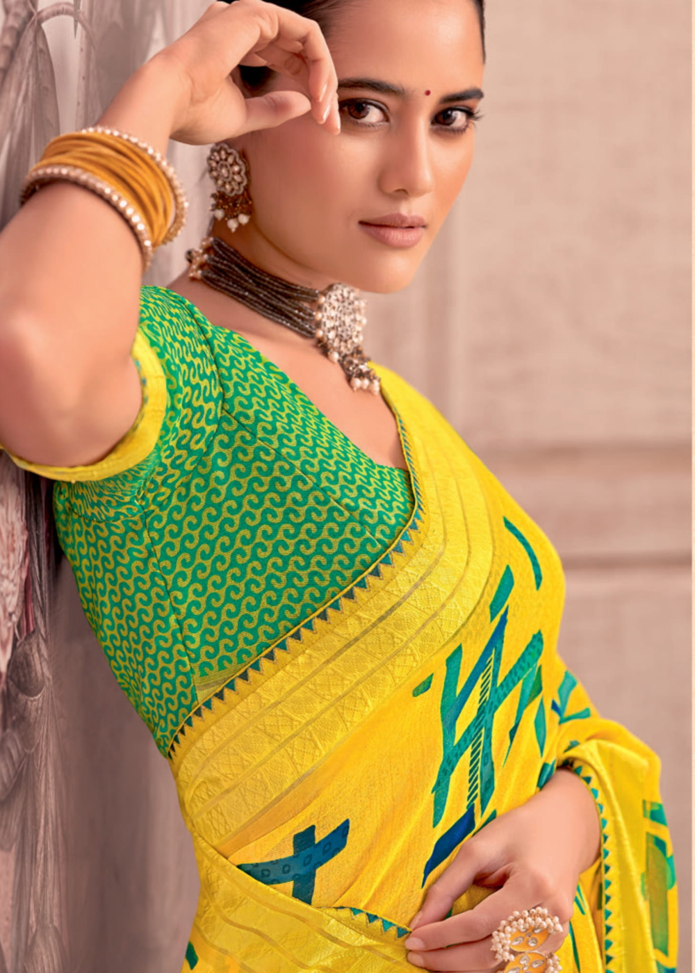Yellow Georgette Shimmer Saree with Green Abstract Print