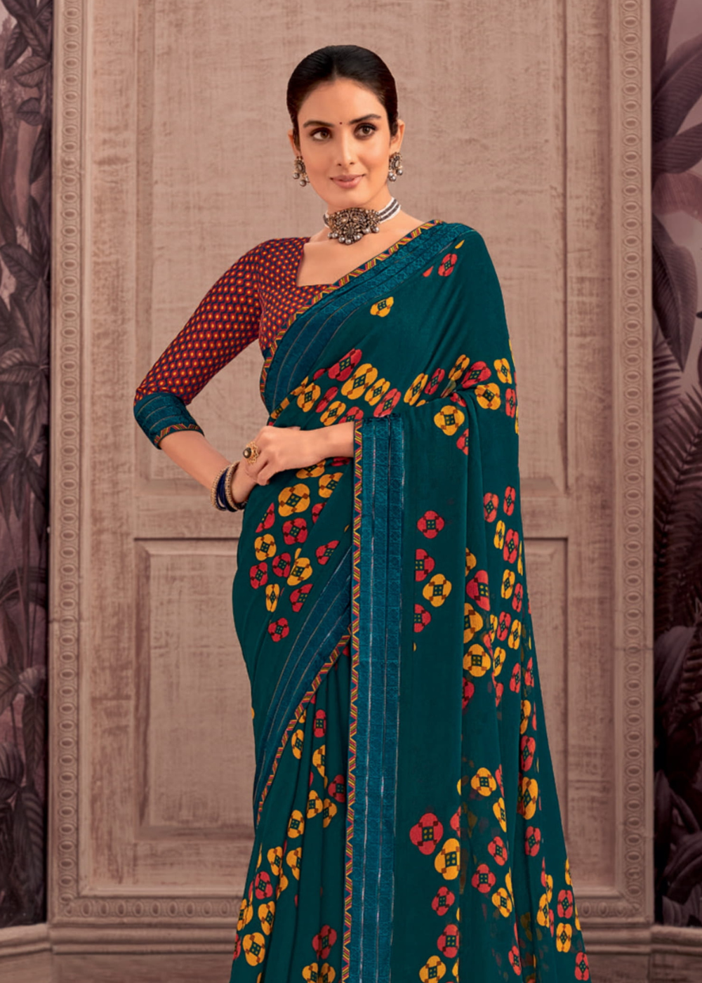 Teal Georgette Shimmer Saree with Yellow & Red Motifs