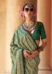 Teal Green Patola Silk Saree with Stud & Epoxy Work
