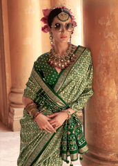 Teal Green Patola Silk Saree with Stud & Epoxy Work