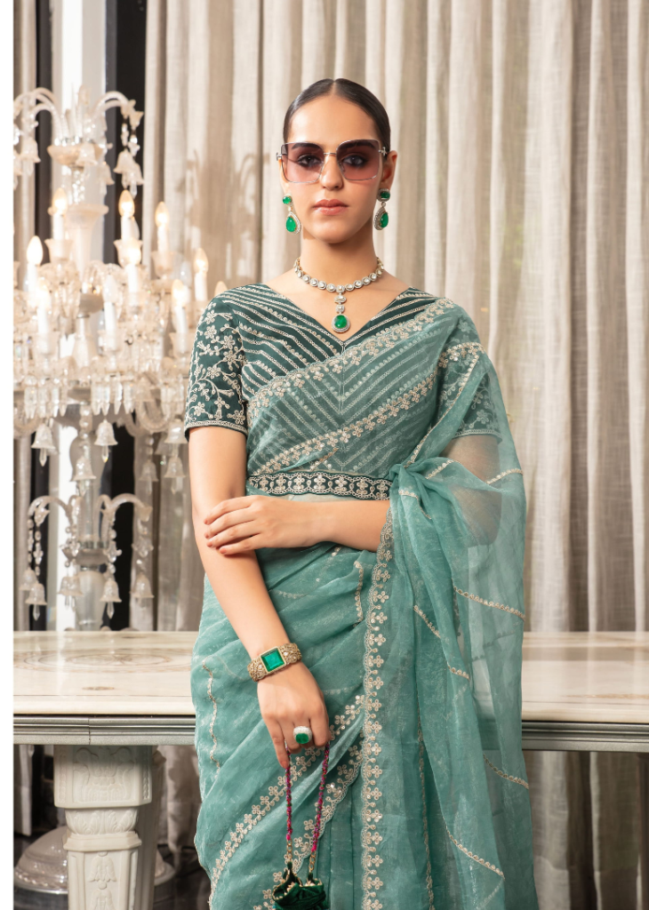 Aqua Blue Organza Saree with Embroidered Blouse & Border