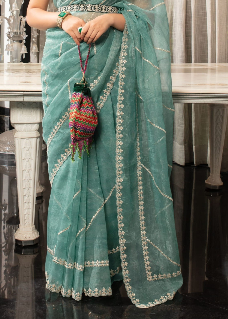 Aqua Blue Organza Saree with Embroidered Blouse & Border